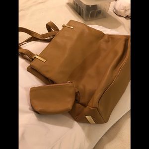 Camel color faux leather shoulder bag.